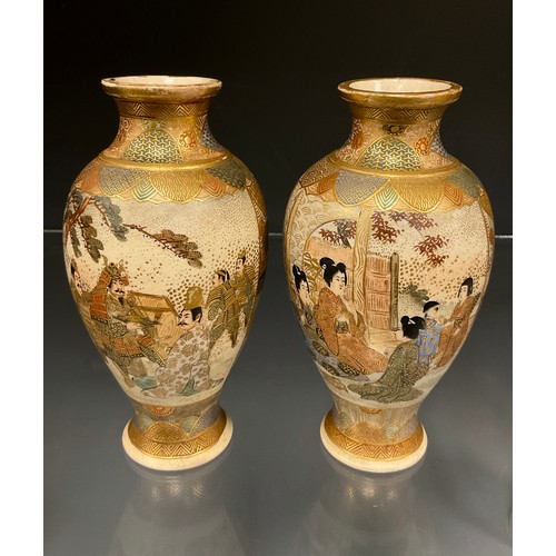 429 - A pair of Japanese Satsuma baluster vases, decorated with panels of Samurai and ladies within typica... 