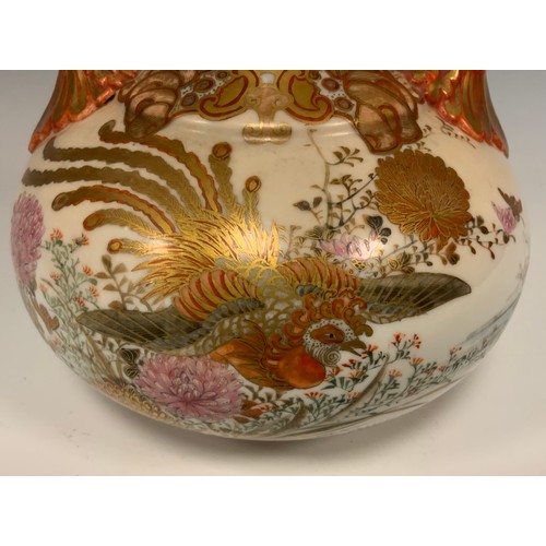 413 - A Japanese Meiji period Kutani porcelain vase, the twin handled body painted with Peacocks and flowe... 