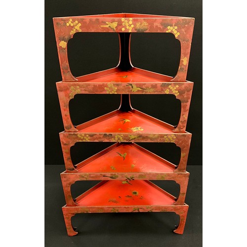 441 - A nest of five Japanese red-lacquered corner or stacking tables, with gilded decoration of birds amo... 