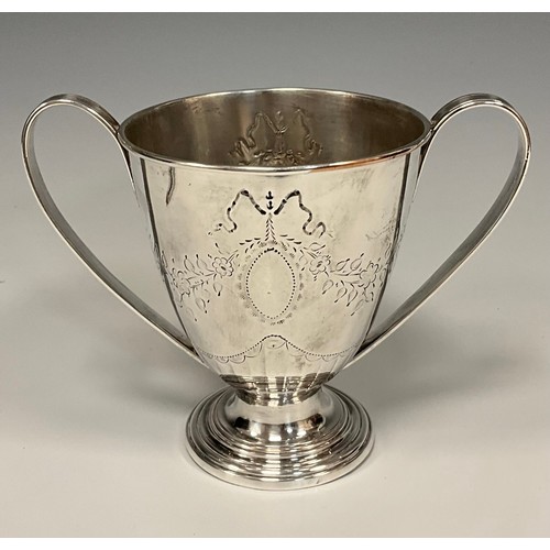 128 - A George III Old Sheffield Plate loving cup, chased in the Neo-Classical taste with ribbon-tied flow... 