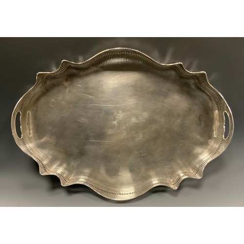 131 - A large George III Old Sheffield plate shaped serpentine gallery tray, pierced wavy border with carr... 