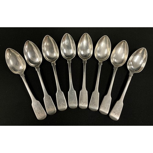 76 - A set of six George IV silver fiddle pattern dessert spoons, Robert Gainsford, Sheffield 1824;  anot... 