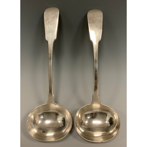 65 - A pair of William IV Irish silver sauce ladles, Samuel Neville, Dublin 1835, 3.84ozt (2)