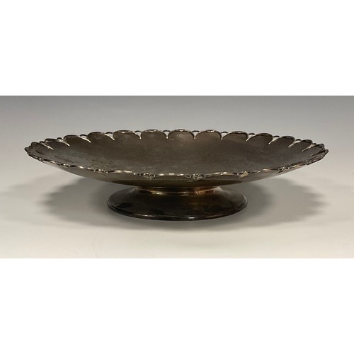 82 - An Elizabeth II silver cake stand, shaped circular leafy dished platform, embossed with Rose Sprays,... 