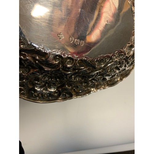 43 - A late Victorian silver sweet meat dish, embossed decoration of flowers and scrolls, London 1895, 21... 