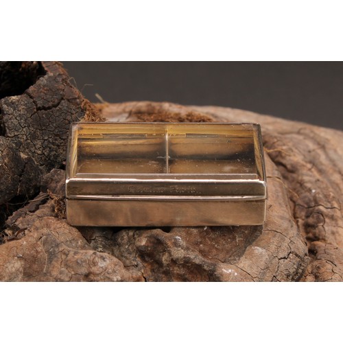 88 - A Victorian silver rectangular stamp box, hinged glazed cover enclosing a gilt interior with two div... 