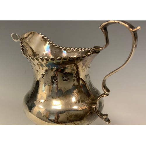 6 - A George III silver cream jug, makers marks worn possibly J K, Chester 1780, 90.0g, 11cm high