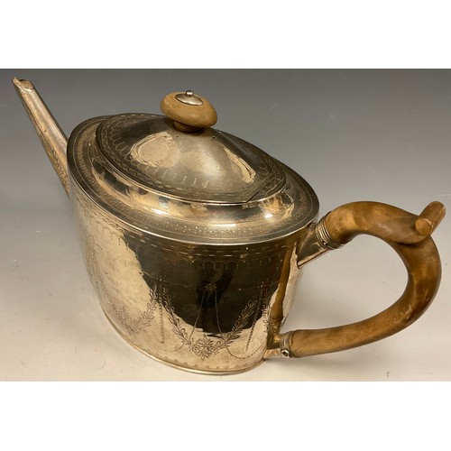 18 - A George III silver teapot, oval body with floral swags and leafy motifs, wooden handle and finial, ... 