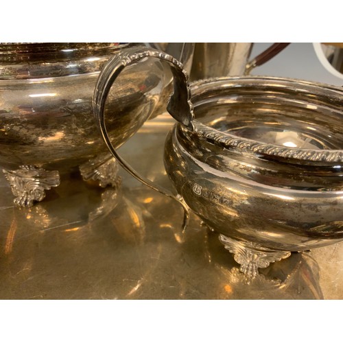 46 - A mid 20th century Barker Brothers Silver Ltd five piece silver tea service on oval tray including t... 