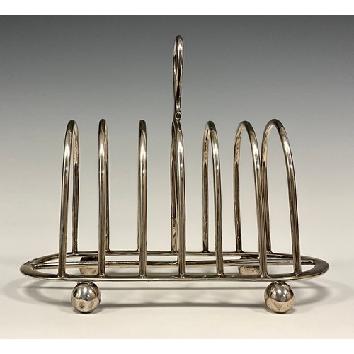 90 - A Victorian silver six division toast rack, James Deakin & Sons (John & William F Deakin), Sheffield... 