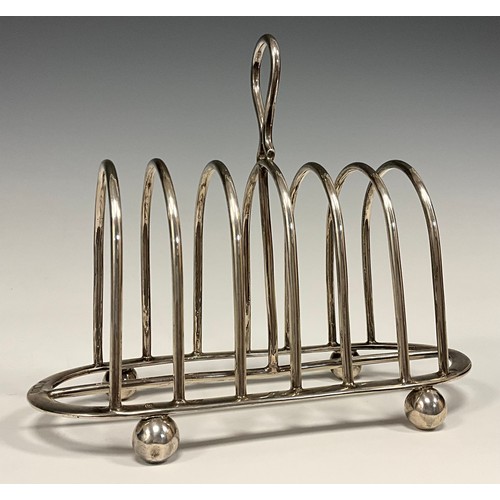 90 - A Victorian silver six division toast rack, James Deakin & Sons (John & William F Deakin), Sheffield... 