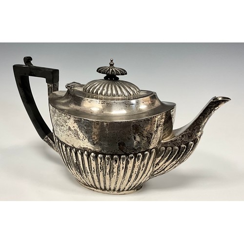 36 - A George V silver teapot, gadrooned body, ebony handle, James Deakin & Sons (John & William F Deakin... 