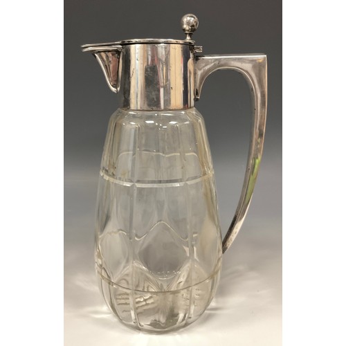 96 - An early 20th century German silver mounted claret jug, hinged cover with posted sphere thumbpiece, ... 