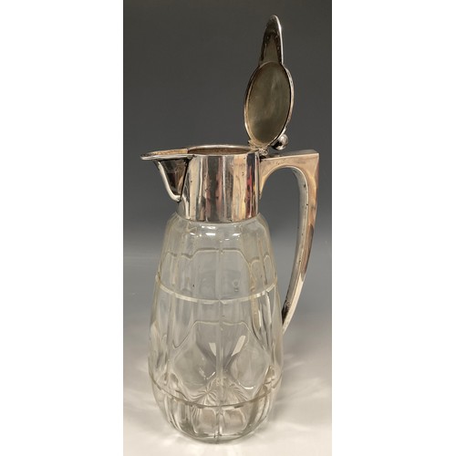 96 - An early 20th century German silver mounted claret jug, hinged cover with posted sphere thumbpiece, ... 