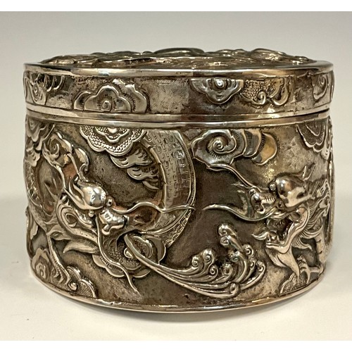 138 - A Chinese silver embossed cache pot, decorated with Dragons chasing the Pearl of Wisdom, impressed c... 