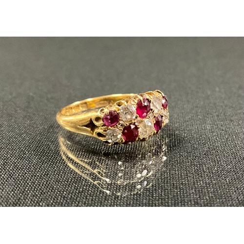 241 - A ruby and diamond chequered ring, set with five cushion and four rose cut diamonds and five red rub... 