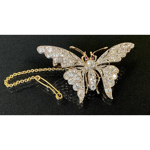 208 - A fine Victorian diamond butterfly brooch, set in gold and silver metal, with ruby cabochon eyes, pa... 