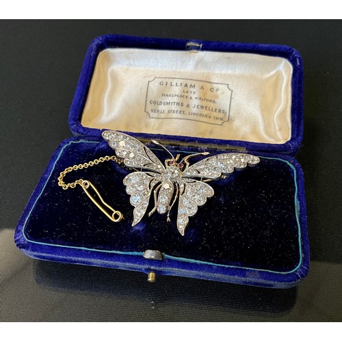 208 - A fine Victorian diamond butterfly brooch, set in gold and silver metal, with ruby cabochon eyes, pa... 