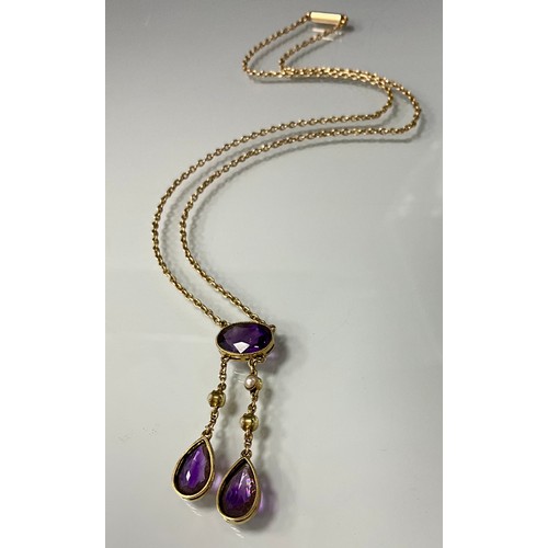 281 - An Edwardian amethyst and seep pearl double drop pendant necklace, principle oval vibrant purple ame... 