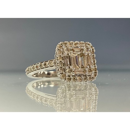 273 - An Art Deco style diamond cluster ring, square crest set with six baguette and twenty seven round br... 