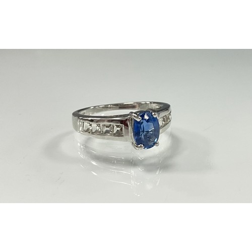 168 - A certified kyanite and white stone ring, oval mixed cut kyanite 0.95ct, claw set above white stone ... 