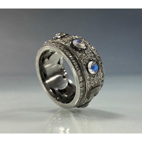 211 - A Gothic style diamond and moonstone eternity ring, set with nine cabochon moonstones approx 2.40ct,... 