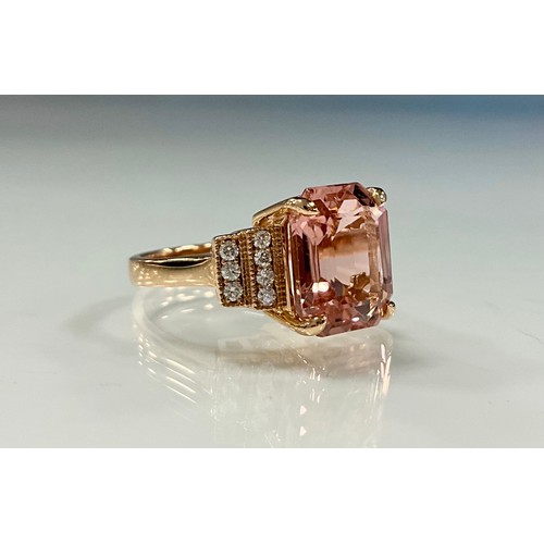 170 - A certified pink tourmaline and diamond ring, octagonal step cut purply pink tourmaline, 5.21ct, bet... 