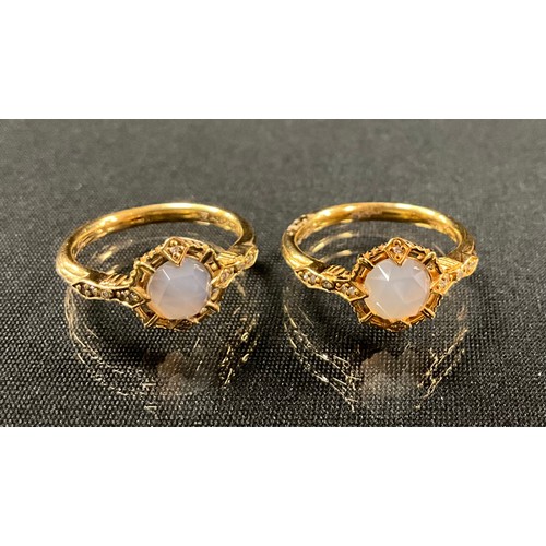 233 - A pair of Thomas Sabo gold plated silver dress rings, size N, 6g gross (2).