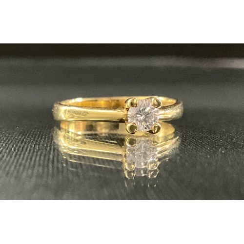 201 - A diamond solitaire ring, round brilliant cut diamond approx 0.24ct, size K, 3.2g gross.