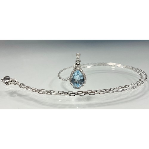 269 - An Aquamarine and diamond pendant necklace, central pear cut aquamarine 0.93ct, surrounded by round ... 