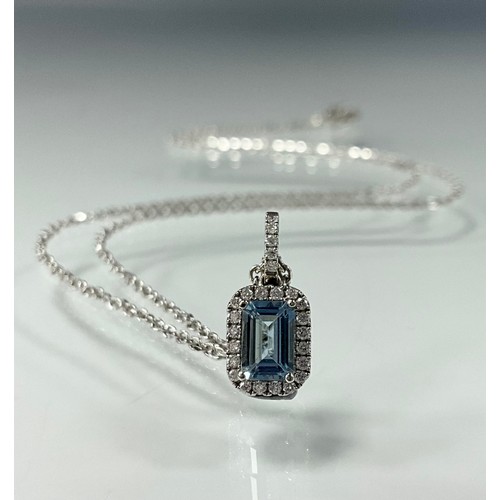 270 - An aquamarine and diamond pendant necklace, rectangular aquamarine 0.58ct, surrounded by round brill... 