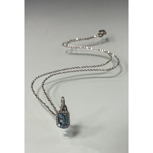 270 - An aquamarine and diamond pendant necklace, rectangular aquamarine 0.58ct, surrounded by round brill... 