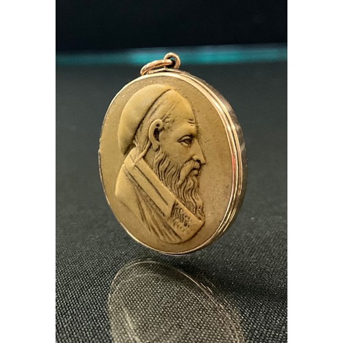 161 - A 19th century lava cameo pendant, bearded male facing to dexter, wearing a cloth skull cap, long fl... 