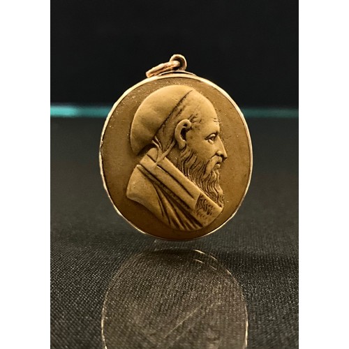 161 - A 19th century lava cameo pendant, bearded male facing to dexter, wearing a cloth skull cap, long fl... 