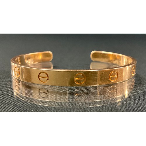 298 - Cartier - an 18ct gold Love bangle, open back, marled Cartier, 17, *1TO, 750, FN3171, 6.5mm wide, 25... 