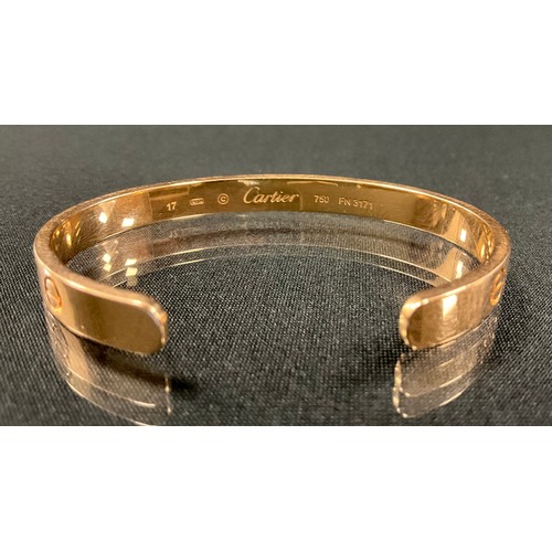 298 - Cartier - an 18ct gold Love bangle, open back, marled Cartier, 17, *1TO, 750, FN3171, 6.5mm wide, 25... 