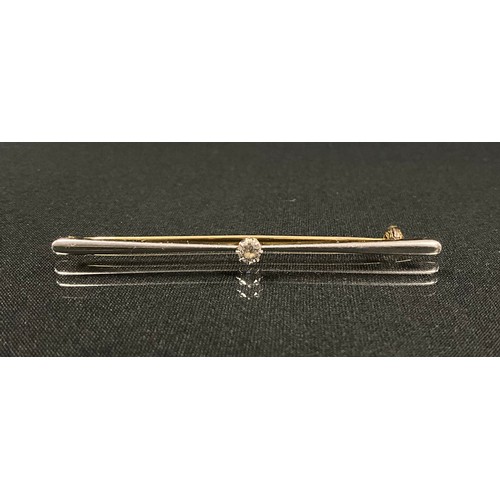 196 - A diamond bar brooch, tapering bar with single round brilliant cut diamond approx 0.15ct to centre, ... 