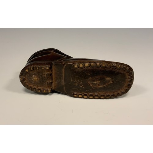 659 - Treen - a mahogany novelty table snuff box, as a boot, 14.5cm long