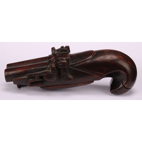 654 - Snuff - A rare 19th century treen snuff box, carved as a flintlock pistol, hinged cover to underside... 