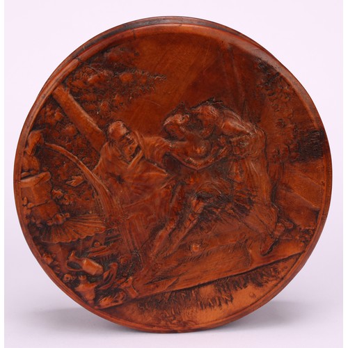 647 - Snuff - A 19th circular century pressed walnut tortoiseshell lined snuff box, the cover decorated wi... 