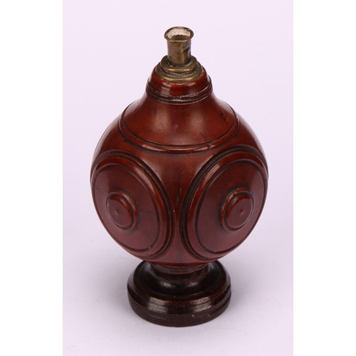 628 - Snuff - a 19th century coquilla nut snuff flask of squared spherical form, the sides with turned rou... 