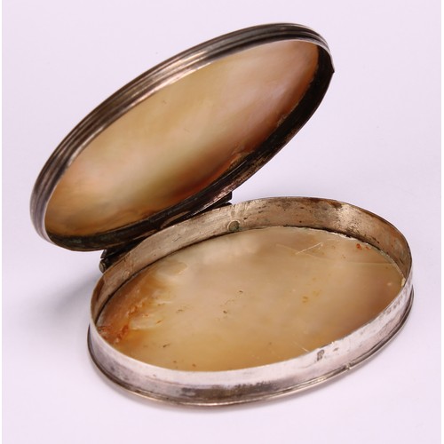 650 - Snuff - a George III oval mother of pearl snuff box, carved with a prawn and fish, silver coloured m... 