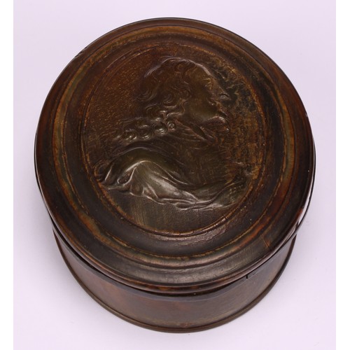 655 - Snuff - an early 18th century oval pressed horn snuff box, probably by John Obrisset, the cover with... 