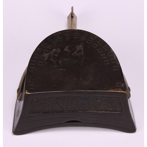 658 - Snuff - an unusual bronze novelty snuff box as a spurred heal, 9.5cm long, c.1890