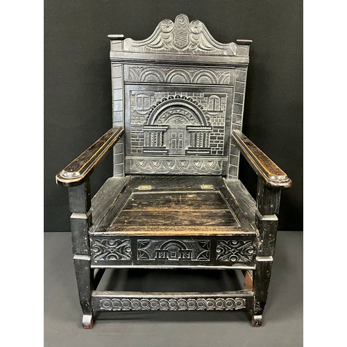 1236 - A Jacobean revival carved oak Church warden’s or Wainscot chair, 118cm high x 78cm wide, c.1880.