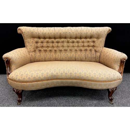 1266 - A Victorian walnut sofa, of small proportions, deep-buttoned stuffed-over upholstery, carved scroll ... 