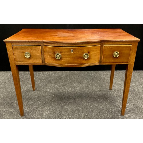 1115 - A George III mahogany hall table, the top with reeded edge, above three drawers to the slightly bowe... 