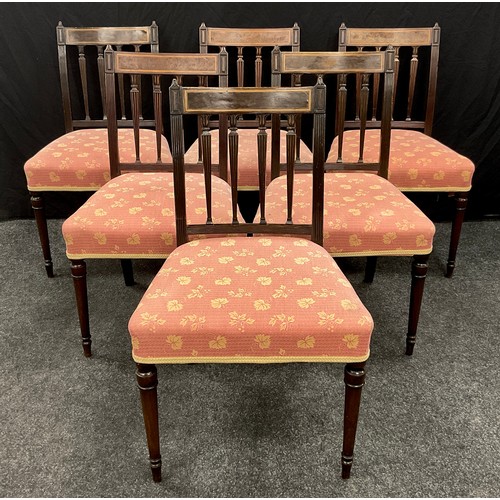 1241 - A set of six George IV mahogany and burr yew dining chairs, each bar back above a row of tapered ree... 