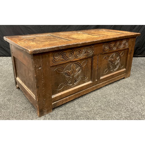 868 - A Charles II oak three panel blanket chest, of small proportions, hinged top, carved front, 45cm hig... 