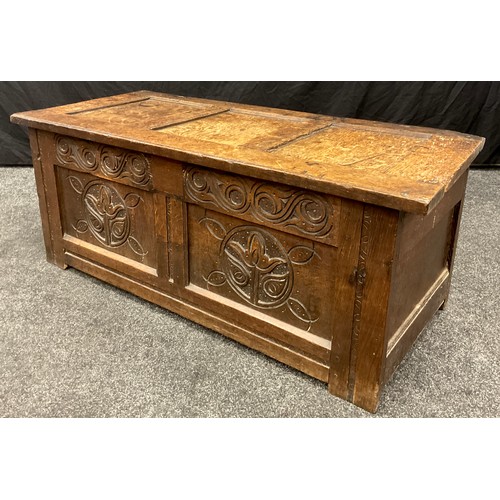 868 - A Charles II oak three panel blanket chest, of small proportions, hinged top, carved front, 45cm hig... 